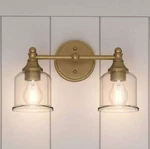 Signature Hardware Hesby 2-LIGHT Vanity, Clear Shade, Aged Brass. Fixed Price $142.45.