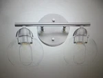 Uixe 13.33 In. 2-LIGHT Brushed Nickle Bathroom Vanity W Clear Glass Shade. Fixed Price $22.75.