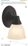 Forte Bathroom Vanity Light Fixture, Wall Sconce, Positional Matte Black. Fixed Price $35.00.