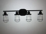 Hampton Bay Southbourne 28 In. 4-LIGHT Matte Black Vanity Open Steel Cage. Fixed Price $34.95.