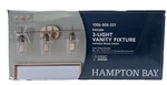 Hampton Bay Pavlen 24 In. 3-LIGHTS Antique Brass Vanity With Clear Glass. Fixed Price $23.74.