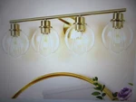 Deyidn Modern 29.53 In. 4-LIGHT Gold Bathroom Vanity W Clear Globe Shades. Fixed Price $47.45.
