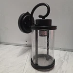 Dusk To Dawn 12INCH Matte Black Wall Lantern/ Seeded Glass Round. Fixed Price $44.99.