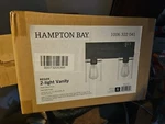 Hampton Bay DSHD19574V1 Regan 12.75 In 2-LIGHT Matte Black Bathroom Vanity. Fixed Price $50.00.