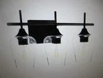 Merra 3-LIGHT Black Bathroom Vanity With Seeded Glass Shades. Fixed Price $31.30.