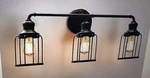 Cedar Hill 24 In. 3-LIGHT Black Industrial Vanity With Metal Cage Wall Sconce. Fixed Price $59.97.