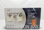 Hampton Bay Truitt 2 Light Brushed Nickel Vanity Frosted Glass. Fixed Price $26.92.