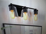 Uolfin Modern Bell Vanity For Bathroom Kurozo 3-LIGHT Matte Black. Fixed Price $50.96.