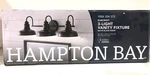 Hampton Bay 29 In. Elmcroft 3-LIGHT Matte Black Bathroom Vanity (open). Fixed Price $42.95.