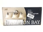 Hampton Bay Ashhurst 3-LIGHT Brushed Nickel Vanity New. Fixed Price $38.99.