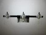 Robert Stevenson Jameson 22IN 3-LIGHT Matte Black & Polished Nickel Vanity. Fixed Price $51.25.