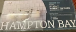Hampton Bay Tustna 3-LIGHT Bathroom Vanity Brushed Nickel Opal Glass. Fixed Price $78.37.