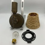 Urban Electric Brass Left Hand Holding Torch Wall Sconce With Woven Lamp Shade. Fixed Price $799.99.