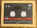 New Canarm Carson Light Vanity, Matte Black - Seeded Glass 100W IVL705A02BK. Fixed Price $29.00.