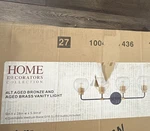Home Decorators Collection Led 4-LIGHT Dimmable Vanity, Aged Bronze/brass 24IN. Fixed Price $50.00.