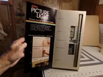 12" Picture Nickle Finish Wall Light. Zelco Model 10008. Fixed Price $10.00.