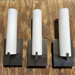 Trio Of Wall Sconce Lights, White Frosted Glass, Brushed Nickel Mount Hardware. Fixed Price $90.00.