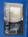 Hampton Bay Obsidian 1-LIGHT Wall Sconce Brushed Nickel Frosted Seeded Glass. Fixed Price $27.47.