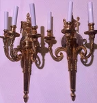 Metropolitan 3 Light 20 Inch French Gold Wall Sconce With White Candlesticks. Fixed Price $595.00.