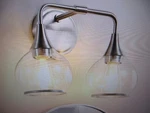 Kaisite 14.2 In. 2-LIGHT Brushed Nickel Bathroom Vanity With Clear Globe. Fixed Price $37.95.