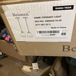 2 Pack Modern Glass Pendant Light, Brushed Nickel, Clear Holder, Beionxii. Fixed Price $34.99.
