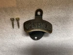 Brown Old Style Wall Mounted Bottle Opener With Hardware. Fixed Price $10.00.
