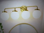 Deyidn 30.71 In. 4-LIGHT Gold Bathroom Vanity With Opal Glass Shades. Fixed Price $79.96.