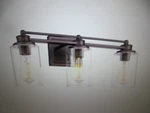 Jazava Farmhouse 22.5 In. 3-LIGHT Oil-rubbed Bronze Bathroom Vanity. Fixed Price $47.45.
