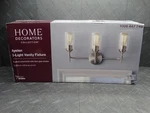 Home Decorators Ayelen 22 In 3-LIGHT Brushed Nickel Modern Bathroom Vanity. Fixed Price $31.99.