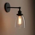 Pathson Vintage Wall Sconce With Clear Glass Shade, Metal Base Matte Black. Fixed Price $68.36.