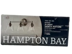 Hampton Bay Marsden 23.5 In. 3-LIGHT Brushed Nickel Transitional Vanity. Fixed Price $40.49.