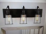 Uolfin Farmhouse Rustic Oil-rubbed Bronze Vanity Light, 22 In. 3-LIGHT Sconce. Fixed Price $64.56.