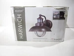 Vaxcel One Light Motion Sensor Outdoor Wall Sconces - Harwich Dualux 8.25". Fixed Price $62.95.