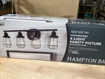 Hampton Bay Southbourne 4-LIGHT Matte Black Industrial Bathroom Vanity. Fixed Price $34.99.