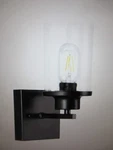 Briignite 7.09 In. 1-LIGHT Antique Black Wall Sconce With Clear Glass Shade. Fixed Price $28.01.