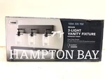 Hampton Bay Regan 21 In. 3-LIGHT Espresso Bronze Bathroom Vanity New. Fixed Price $44.99.
