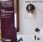 Home Decorators Collection Evelyn 1 Light Wall Sconce Bronze Finish/clear Glass. Fixed Price $19.99.