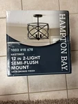 Hampton Bay Hastings 12 In. 2-LIGHT Satin Bronze Ceiling Semi-flush Mount. Fixed Price $24.99.