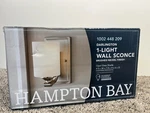 Hampton Bay 1-LIGHT Brushed Nickel Wall Sconce With Clear Glass Shade.. Fixed Price $27.00.