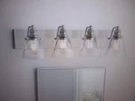 Hampton Bay Manor 33IN. 4-LIGHT Polished Nickel Industrial Bathroom Vanity. Fixed Price $50.96.