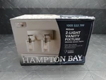 Hampton Bay Regan 12.75 In. 2-LIGHT Brushed Nickel Vanity With Clear Glass. Fixed Price $12.99.
