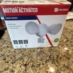 Utilitech Motion Activated Hardwired Led 2-HEAD Security Light, White. Fixed Price $30.00.