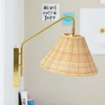 Rattan And Metal Wall Sconce Lighting Fixture Shade, Brushed Brass. Fixed Price $45.95.
