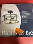New Hampton Bay Richland 2-LIGHT Grey Wood Semi Flush Mount Clear Seedy Glass. Fixed Price $44.00.