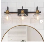 Lnc 22 In. 3-LIGHT Modern Aged Brass And Black Bathroom Vanity. Fixed Price $43.59.