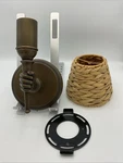 Urban Electric Brass Righthand Holding Torch Wall Sconce With Woven Lamp Shade. Fixed Price $799.99.