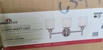 Aubrey Vanity Design House In Brushed Nickel, 3-LIGHT Wall Sconce 556209. Fixed Price $40.00.