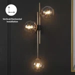 Lnc FZMI2YHD13409B6 Modern Gold Vanity Light With Globe Clear Glass Shades. Fixed Price $109.99.
