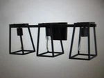 Home Decorators Hazel Heights 24 In. 3-LIGHT Black Rustic Bathroom Vanity. Fixed Price $46.95.