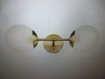 Globe Celestia 19.5 In. 2-LIGHT Matte Brass Wall Sconce With Frosted Glass. Fixed Price $39.95.